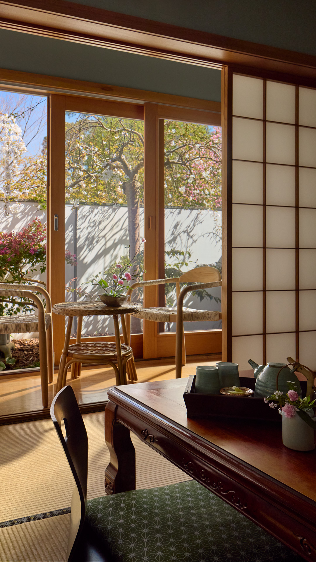 A tatami room at Shizuka Ryokan opening onto the spring garden