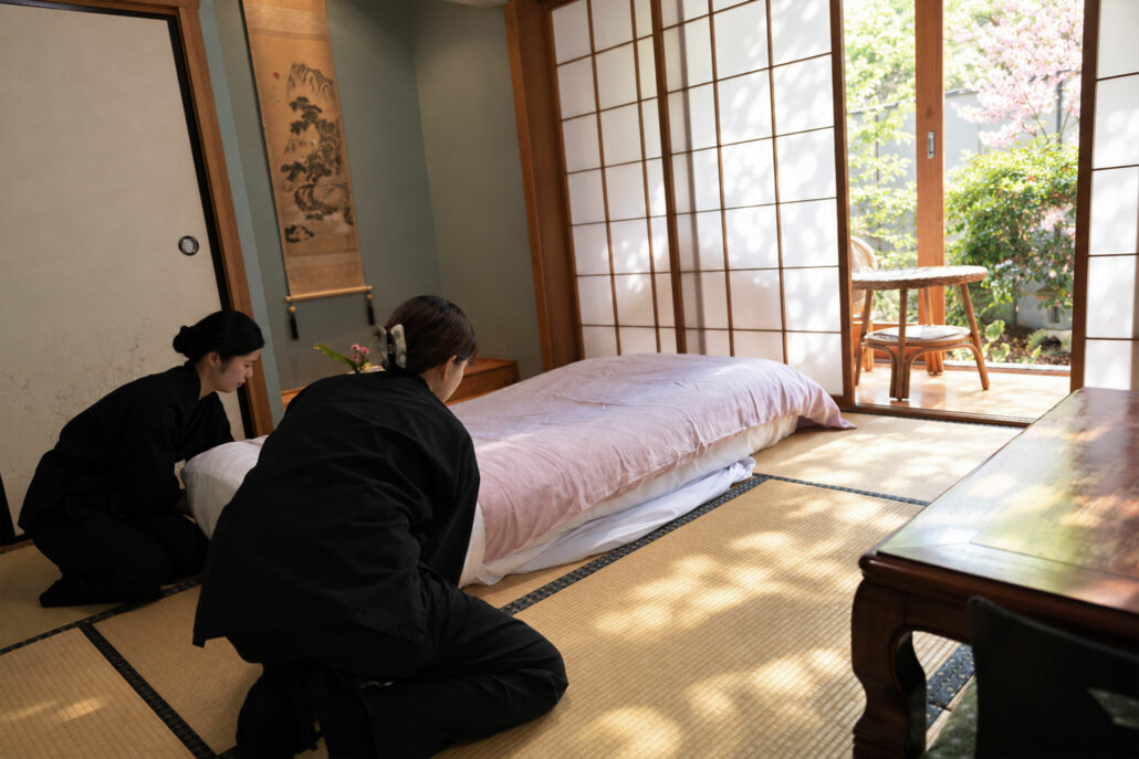 Shizuka staff preparing a guest room